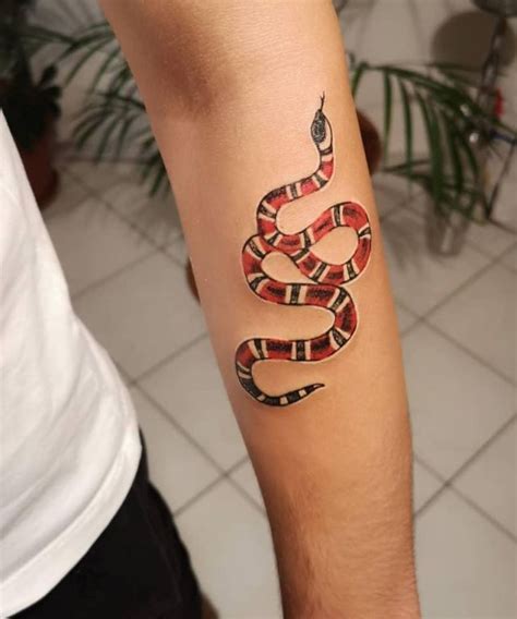 gucci snake tattoo meaning